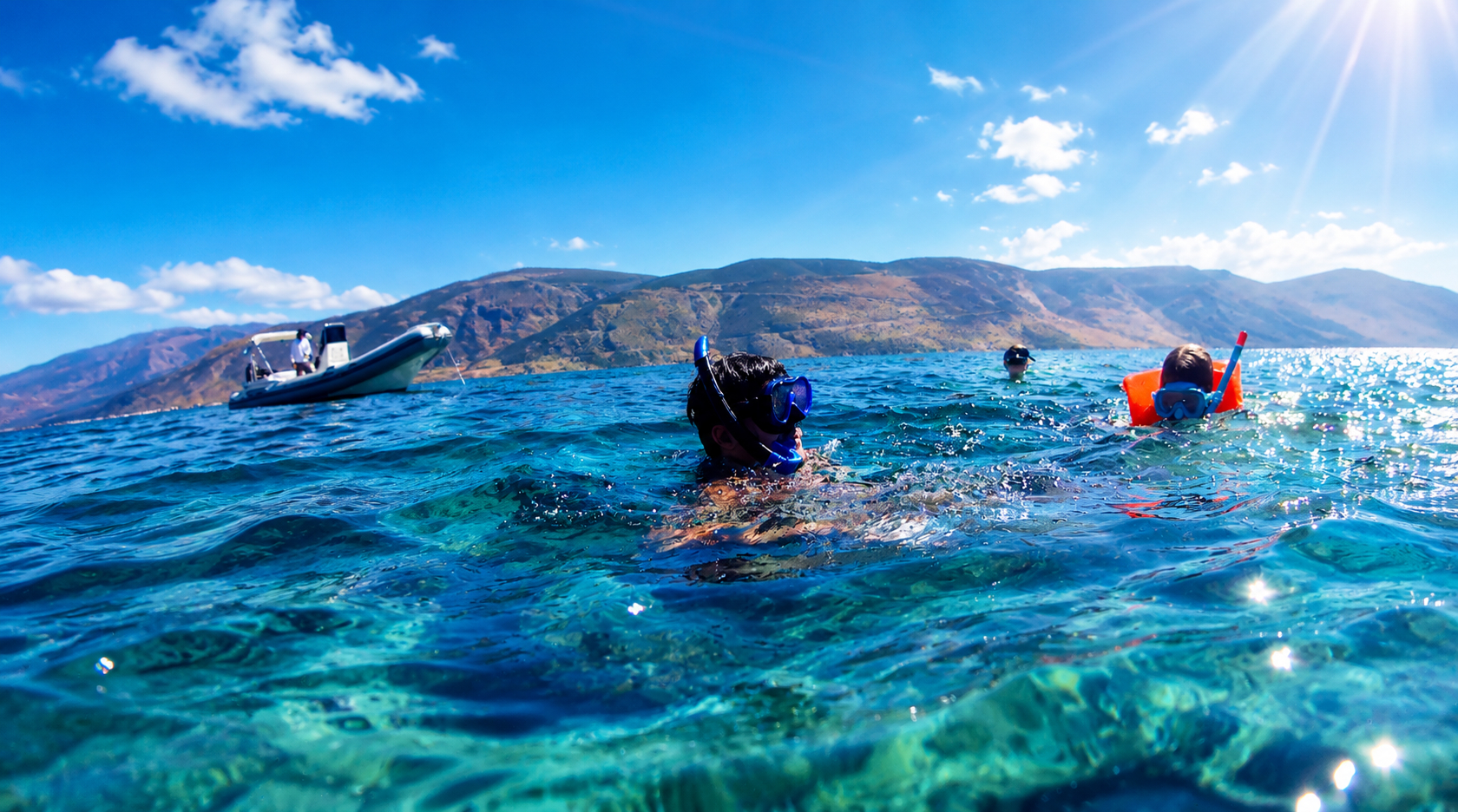 Guests swimming near the RIB in the Gulf of Corinth