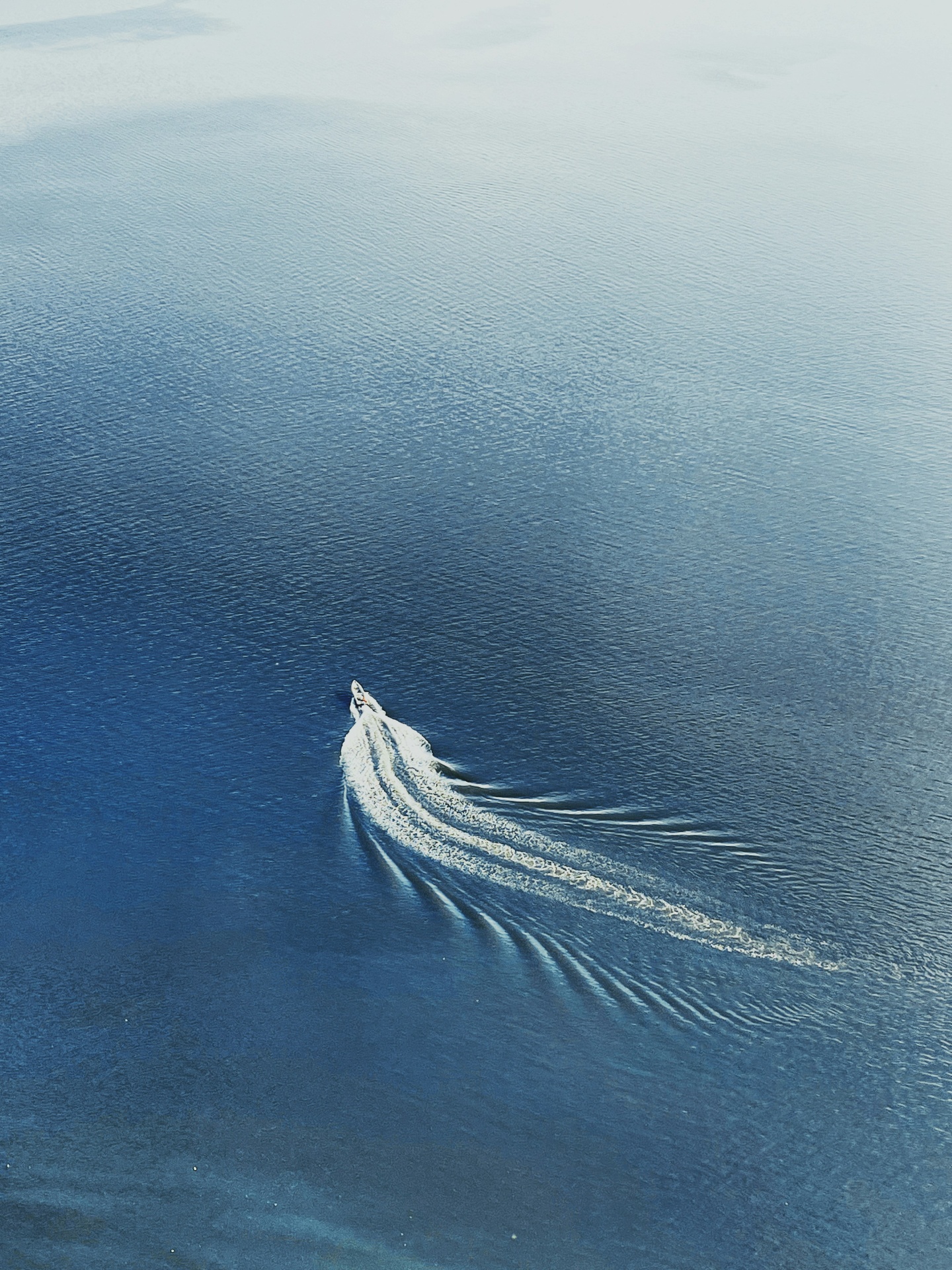 Aerial view of a RIB on the deep blue Gulf of Corinth
